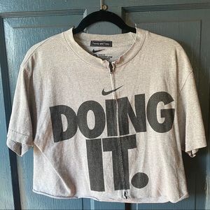 One of a kind Nike zipped tee shirt size Medium